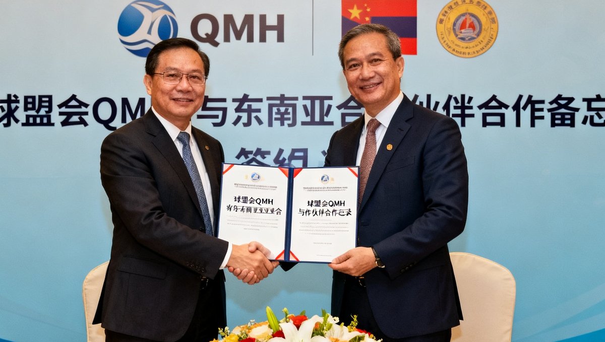 球盟会QMH高管团队与东南亚合作伙伴签约仪式的场景，双方代表握手并展示合作备忘录